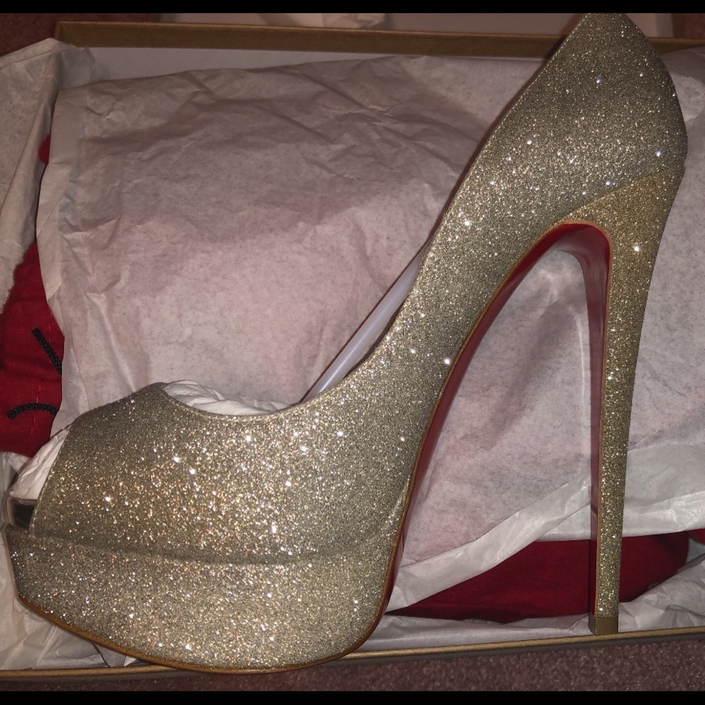 Christian Louboutin Lady peep pumps.
